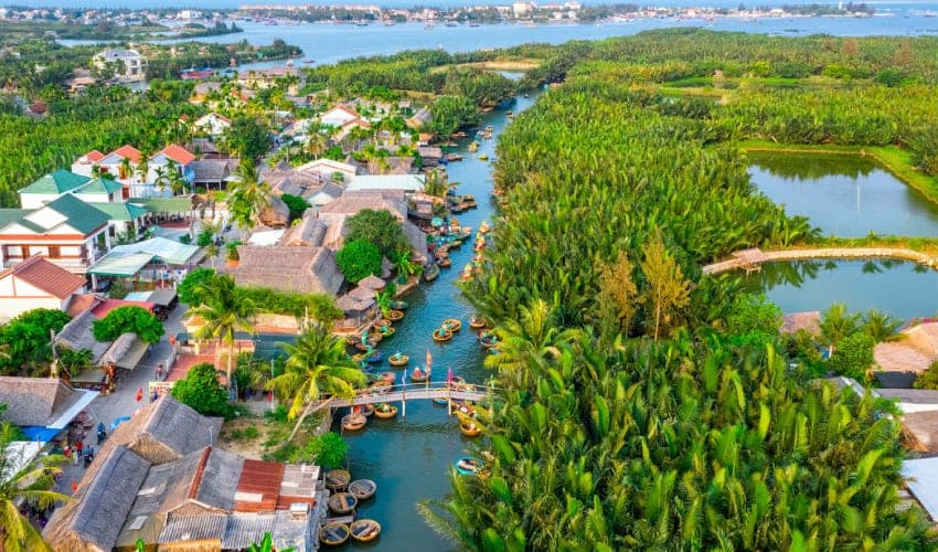BAY MAU COCONUT FOREST IN HOI AN - JUNGLE ECO TOUR (BAMBO BASKET BOAT) Group tour <14 pax Pickup from Danang