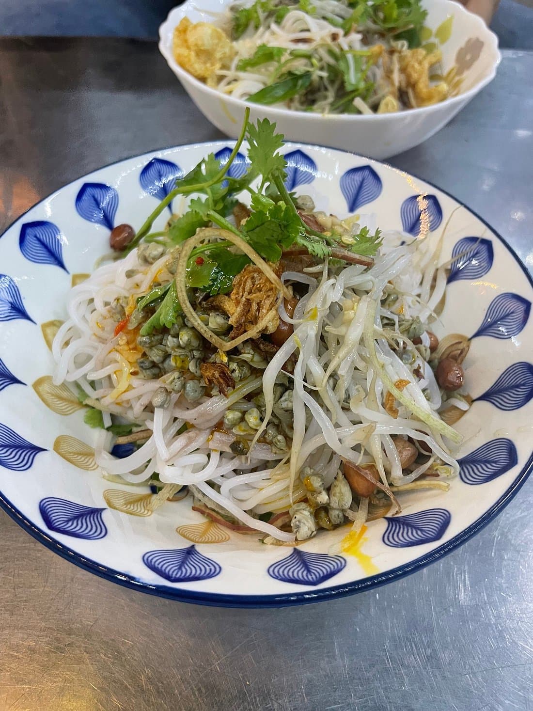 Hue: Night Street Food Tour by E Bike with a Lady Rider